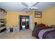 Bedroom featuring a view of a hallway; a bed and other bedroom furnishings are also visible at 7653 Stoney Hill Dr, Wesley Chapel, FL 33545