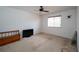 Bedroom featuring white walls, carpet floors, a ceiling fan, and a large window at 7653 Stoney Hill Dr, Wesley Chapel, FL 33545