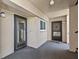 Close-up of condo building entrance with doors labeled 1317 and 1318 at 90 S Highland Ave # 1317, Tarpon Springs, FL 34689
