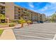 Exterior view of the building with parking and landscaping at 90 S Highland Ave # 1317, Tarpon Springs, FL 34689