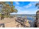 Community deck with picnic tables and lake views at 90 S Highland Ave # 1317, Tarpon Springs, FL 34689