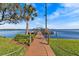 Community dock with boat slips and gated access to the lake at 90 S Highland Ave # 1317, Tarpon Springs, FL 34689