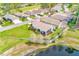 Charming house with a screened-in porch with pond views, situated in a well-maintained neighborhood at 9426 Green Needle Dr, New Port Richey, FL 34655