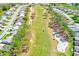 Aerial view of a golf course community showcasing lush greenery and manicured fairways at 9426 Green Needle Dr, New Port Richey, FL 34655