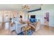 Open-concept living room featuring hardwood floors and an open layout perfect for entertaining at 9426 Green Needle Dr, New Port Richey, FL 34655
