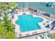 Aerial shot showcasing the large community pool with lap lanes and surrounding lounge area at 9426 Green Needle Dr, New Port Richey, FL 34655