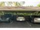 Covered parking area providing ample space for residents' vehicles at 1012 Pearce Dr # 105, Clearwater, FL 33764