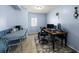 Functional office space with tile flooring, natural light, and ample room for multiple desks at 10900 Oakdale Ave, Port Richey, FL 34668