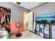 Functional bedroom with closet space, TV, and simple decor, offering practicality at 1407 Overlea St, Clearwater, FL 33755
