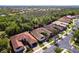 A well-maintained single-story home with mature trees and landscaping in a quiet residential neighborhood at 16106 Amethyst Key Dr, Wimauma, FL 33598