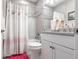 Charming bathroom featuring a shower and tub combo with tile surround, vanity with modern fixtures at 16106 Amethyst Key Dr, Wimauma, FL 33598