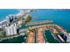 Stunning aerial view of waterfront community with boat docks and breathtaking ocean views at 1621 Gulf Blvd # 308, Clearwater Beach, FL 33767