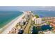 Wide aerial shot showcases the coastal community, beach and ocean at 1621 Gulf Blvd # 308, Clearwater Beach, FL 33767