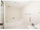 Bathroom with a soaking tub and a toilet at 1621 Gulf Blvd # 308, Clearwater Beach, FL 33767