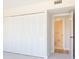 Large closet in bedroom, with a peak into the ensuite bathroom at 1621 Gulf Blvd # 308, Clearwater Beach, FL 33767