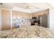 Well-appointed kitchen with granite countertops and stainless steel appliances at 1621 Gulf Blvd # 308, Clearwater Beach, FL 33767