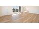 Bright living room with large windows providing lots of natural light and beautiful new wood floors at 1621 Gulf Blvd # 308, Clearwater Beach, FL 33767