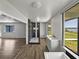 Bathroom with a modern shower and tub, complemented by scenic outdoor views at 18253 Townsend House Rd, Dade City, FL 33523