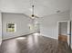 Bright bedroom with ample natural light and neutral tones at 18253 Townsend House Rd, Dade City, FL 33523