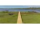 A new wooden dock on the waterfront for relaxing and enjoying lake views at 18253 Townsend House Rd, Dade City, FL 33523