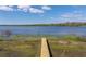 A new wooden dock on the waterfront for relaxing and enjoying lake views at 18253 Townsend House Rd, Dade City, FL 33523