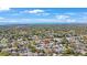 Aerial view of a single Gathering home near a highway and in proximity to the ocean and coastline at 1947 Citrus Hill Ln, Palm Harbor, FL 34683