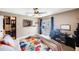 Cozy bedroom with a closet, a ceiling fan, and access to the outdoor pool via sliding glass door at 1947 Citrus Hill Ln, Palm Harbor, FL 34683