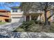 Charming two-story home featuring a well-maintained lawn, inviting front porch, and attached two-car garage at 20220 Autumn Fern Ave, Tampa, FL 33647