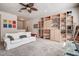 Spacious living room with carpet flooring and built-in shelving at 20220 Autumn Fern Ave, Tampa, FL 33647