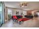 Living room featuring an open floor plan with a smooth transition to the kitchen at 20220 Autumn Fern Ave, Tampa, FL 33647