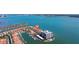 Picturesque waterfront community featuring a marina, boat slips, condos, and stunning views of the bay at 218 Sand Key Estates Dr, Clearwater Beach, FL 33767