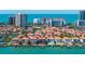 Stunning waterfront community with picturesque views, private docks and luxurious high rise condos in the background at 218 Sand Key Estates Dr, Clearwater Beach, FL 33767