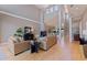 Spacious living room boasts high ceilings, a fireplace, and plenty of natural light at 218 Sand Key Estates Dr, Clearwater Beach, FL 33767