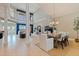 Bright living room with a fireplace, high ceilings, and an open floor plan at 218 Sand Key Estates Dr, Clearwater Beach, FL 33767