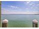 Wide water view showing the beautiful sky meeting the open water, creating a tranquil scene at 218 Sand Key Estates Dr, Clearwater Beach, FL 33767