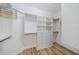 Well-organized walk-in closet with custom shelving and drawers for optimal storage at 2234 Nottingham Greens Dr # 2234, Sun City Center, FL 33573
