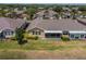 Lovely single-story home with a screened lanai, sunroom and manicured lawn in a serene neighborhood at 2286 Sifield Greens Way # 2286, Sun City Center, FL 33573