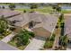 Attractive single-story home with lush landscaping, two-car garage and serene golf course view at 2286 Sifield Greens Way # 2286, Sun City Center, FL 33573