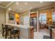 Open kitchen featuring stainless steel appliances and a breakfast bar with seating at 2286 Sifield Greens Way # 2286, Sun City Center, FL 33573