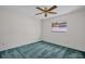 Bedroom with a ceiling fan and a window allowing natural light at 2462 Indian E Trl, Palm Harbor, FL 34683