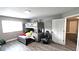 This bedroom features a bunk bed with stuffed animals, a desk, and hardwood flooring at 25631 Bruford Blvd, Land O Lakes, FL 34639