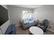 Charming bedroom with unique carriage bed and ample natural light from the window at 25631 Bruford Blvd, Land O Lakes, FL 34639