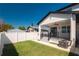 Well-maintained backyard with lush green grass, patio, and a privacy fence at 2608 W Saint Joseph St # 2, Tampa, FL 33607