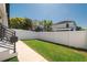 Well-maintained backyard with lush green grass and a privacy fence at 2608 W Saint Joseph St # 2, Tampa, FL 33607