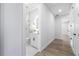 En-suite bathroom featuring modern fixtures, white vanity, and a glass-enclosed shower with a neutral color palette at 2608 W Saint Joseph St # 2, Tampa, FL 33607