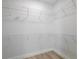 Walk-in closet featuring adjustable shelving for ample storage and organization at 2608 W Saint Joseph St # 2, Tampa, FL 33607