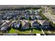 High-angle view of a residential neighborhood, featuring green lawns and well-maintained homes at 2671 Murray Pass, Odessa, FL 33556