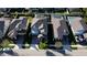 Aerial view of a two-story home with a well-manicured lawn and paved driveway in a suburban neighborhood at 2671 Murray Pass, Odessa, FL 33556