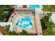 Aerial view of the community splash pad. Perfect for outdoor fun for all ages at 2671 Murray Pass, Odessa, FL 33556