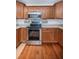 Kitchen features stainless steel appliances and wooden cabinets at 2707 Morningside Dr, Clearwater, FL 33759